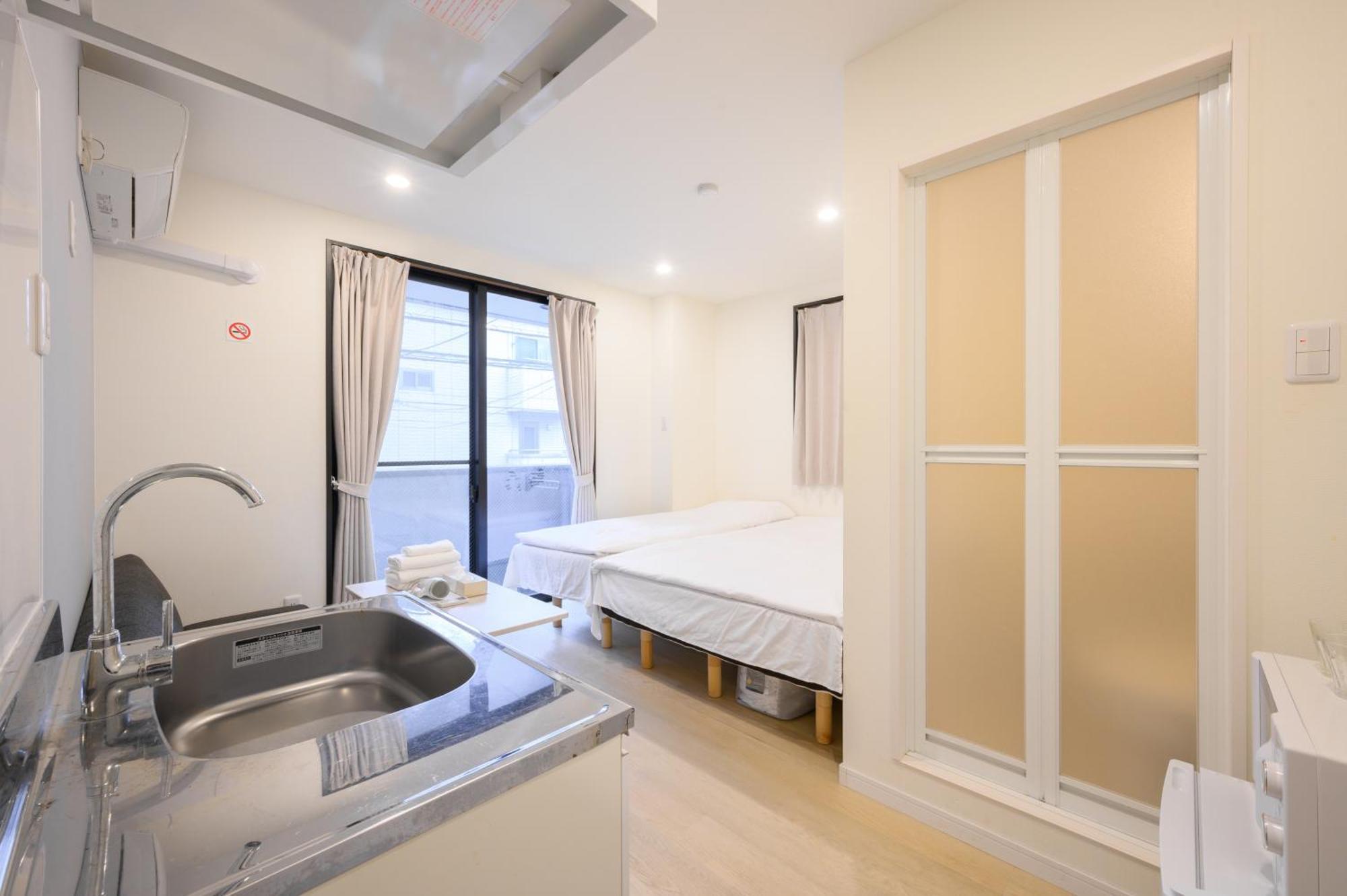 Oku Apartment Tokyo Esterno foto